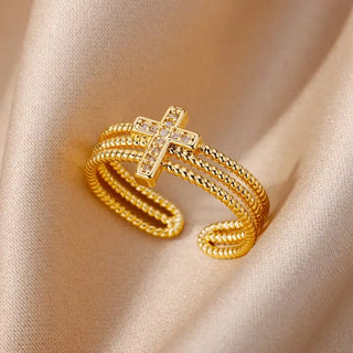 Bague Triple anneau et croix en zircons, finition dorée