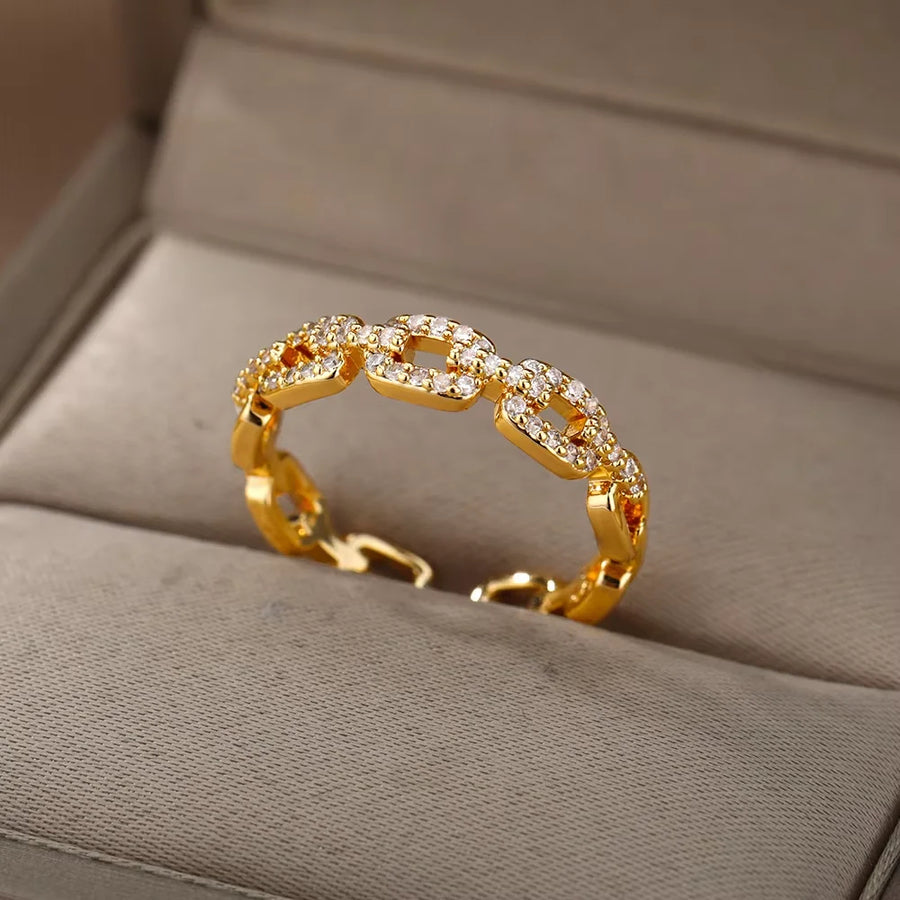 Bague Maillons et zircons, finition dorée